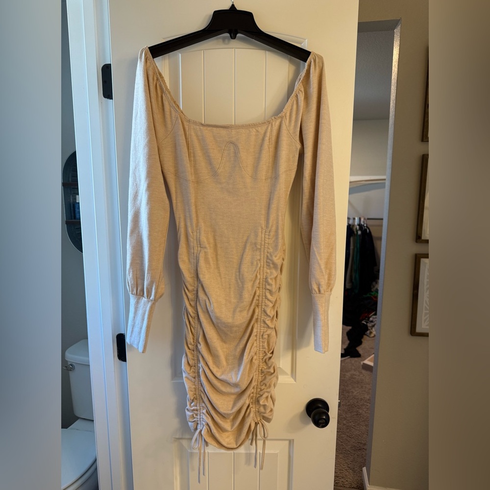 Cream of shoulder fitted dress